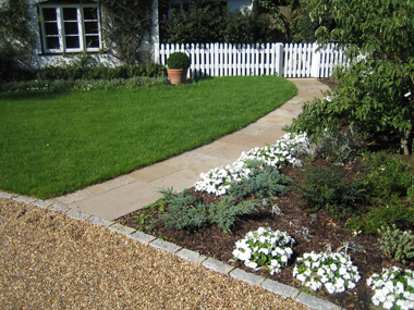 Indian Stone paving pathway and picket fencing